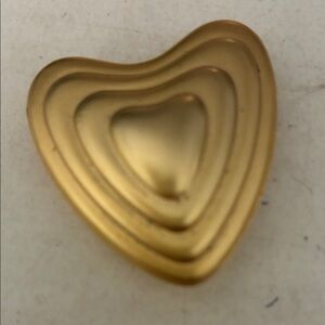 Escada heart shaped sachet solid powder compact.,looks never used. Smells great.